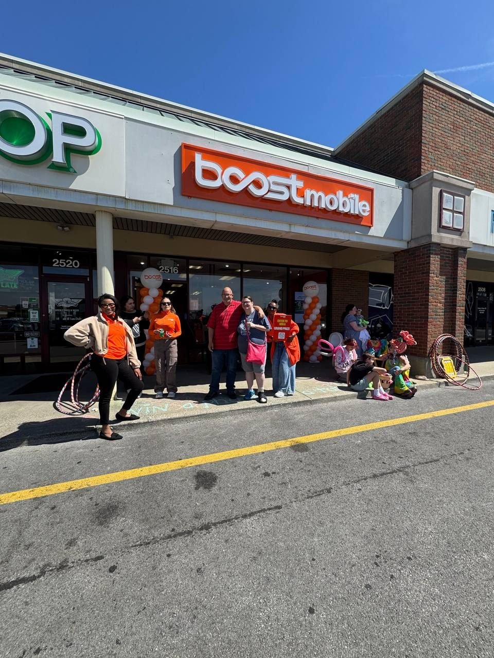 Customers gathered outside an RBFC Boost Mobile store on offer day